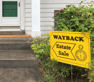 Wayback estate sale sign in front of a house